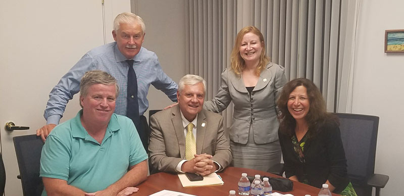 Sharon Seyler, NJSBA legislative advocate met with Assemblywoman Joann Downey, (D-Monmouth) and Assemblyman Eric Houghtaling, (D-Monmouth) standing. Eatontown Board member Bob English and NJSBA immediate past president Don Webster joined the meeting.