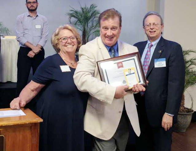 John Kendall, Hadden Township board president, received the 25-year milestone award. Pictured (l-r) are Joyce Miller, Camden County Association president; Kendall; and NJSBA Executive Director Dr. Lawrence S. Feinsod.