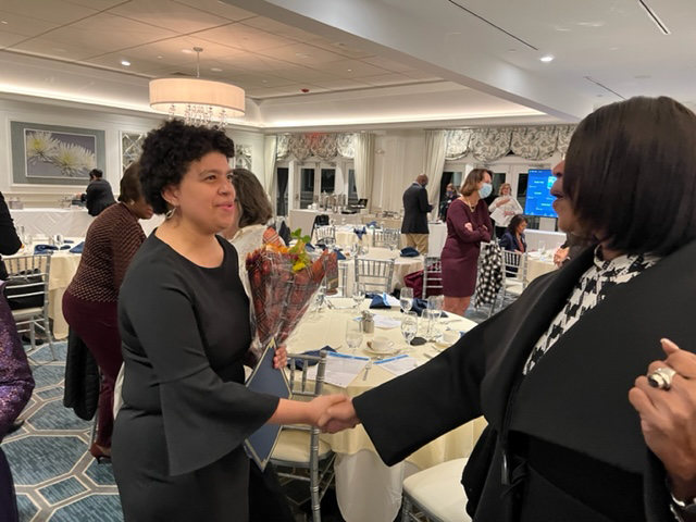 Maura Baker, a student at West Orange High School and the student representative to the New Jersey Board of Education, says hello to Sheila Oliver, lieutenant governor of New Jersey.