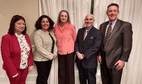 Left to right: Noemi Schlecht, director of curriculum, instruction and assessment at Hanover Park Regional; Maria Carrell, superintendent at Hanover Park Regional; Joanne Greene-Tobias, board member at Hanover Park Regional; Dr. Steven Caponegro, superintendent at Florham Park School District; and John Csatlos, business administrator/board secretary at Florham Park School District enjoy a moment together at the Morris County School Board Association’s Nov. 18 meeting.
