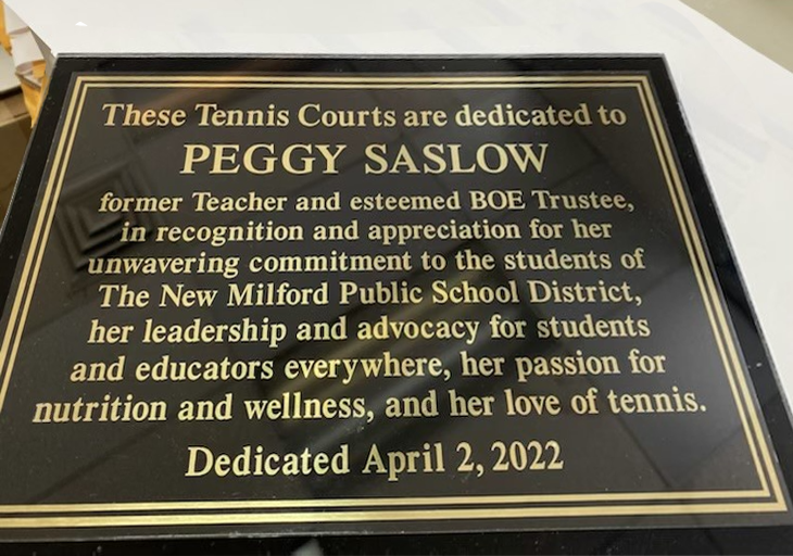 The sign at the New Milford High School tennis courts honoring former NJSBA Board Member of the Year Florence “Peggy” Saslow.