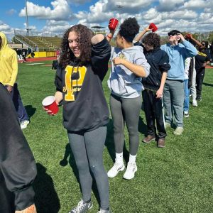 Freshman Seminar students at Piscataway High School took part in Freshman Field Day in April, where the various sections of the class competed against one another in field events and contests, led by their Freshman Seminar teachers and mentors. 