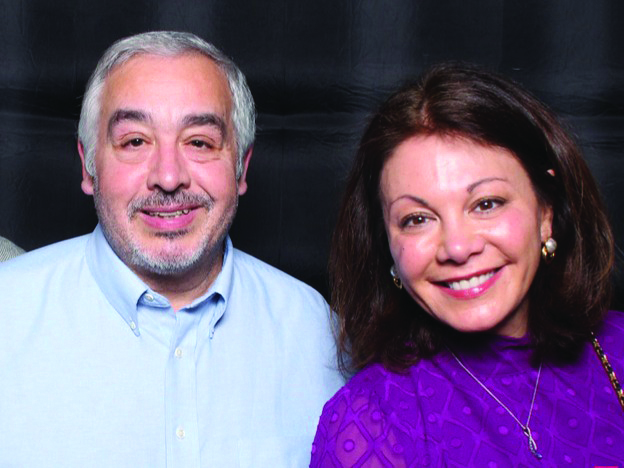 Lou Schimenti and Lauren Cuervo posing for a closeup photo