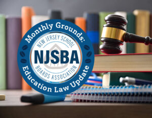 image of colorful legal books with a gavel and the monthly grounds circle logo overlaying the image