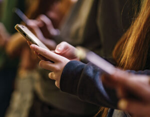 closeup of a student using their phone