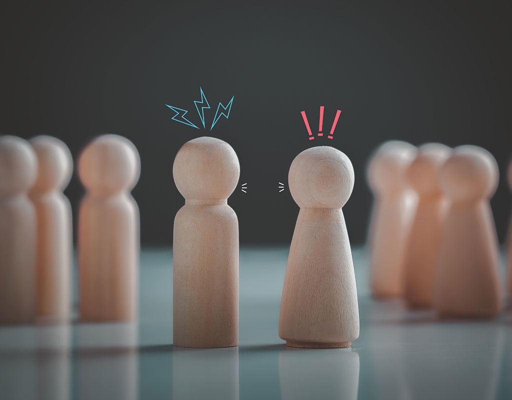 wooden peg figures depicting a fight