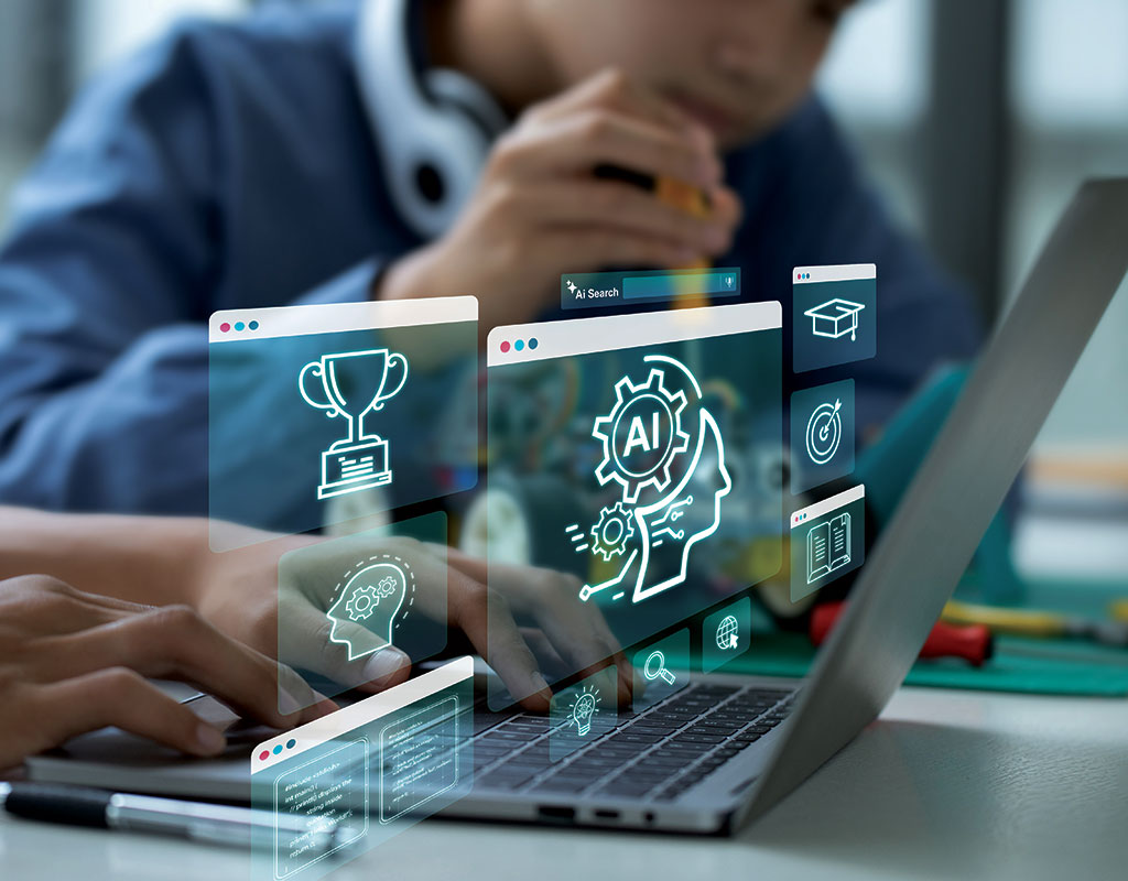photo of students working on a laptop with digital images of technology overlaid