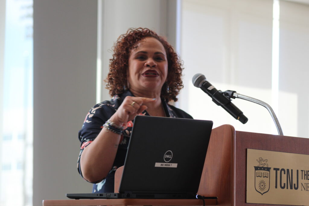 Piscataway Board of Education President Nancy Salgado-Cowan, speaking at podium