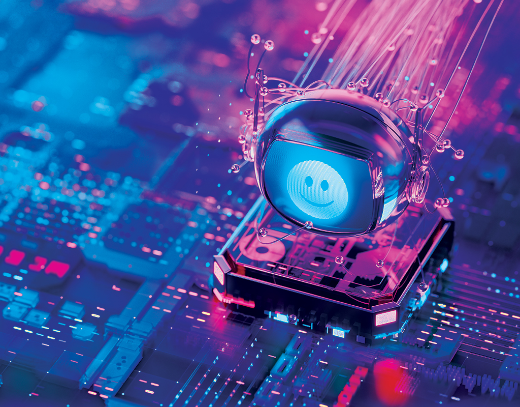 A digital-looking pink and blue desktop computer with a smily face sits atop an abstract pink and blue digital image of a circuit board.